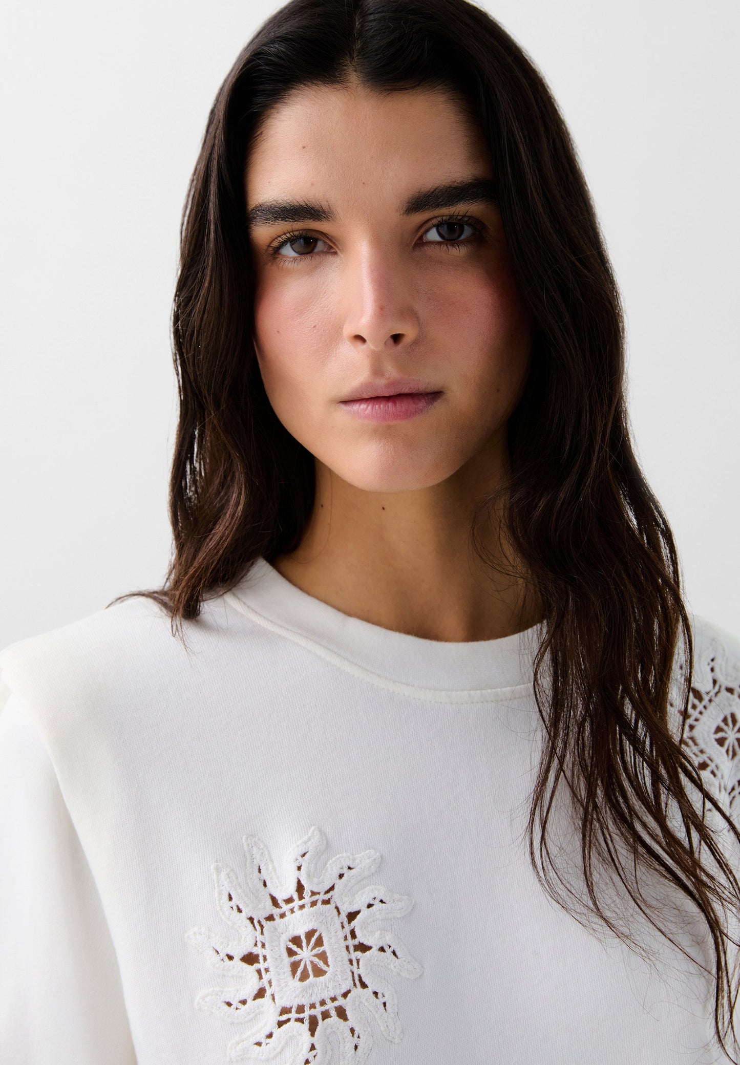 SWEATSHIRT WITH SHOULDER PADS AND CROCHET DETAILS
