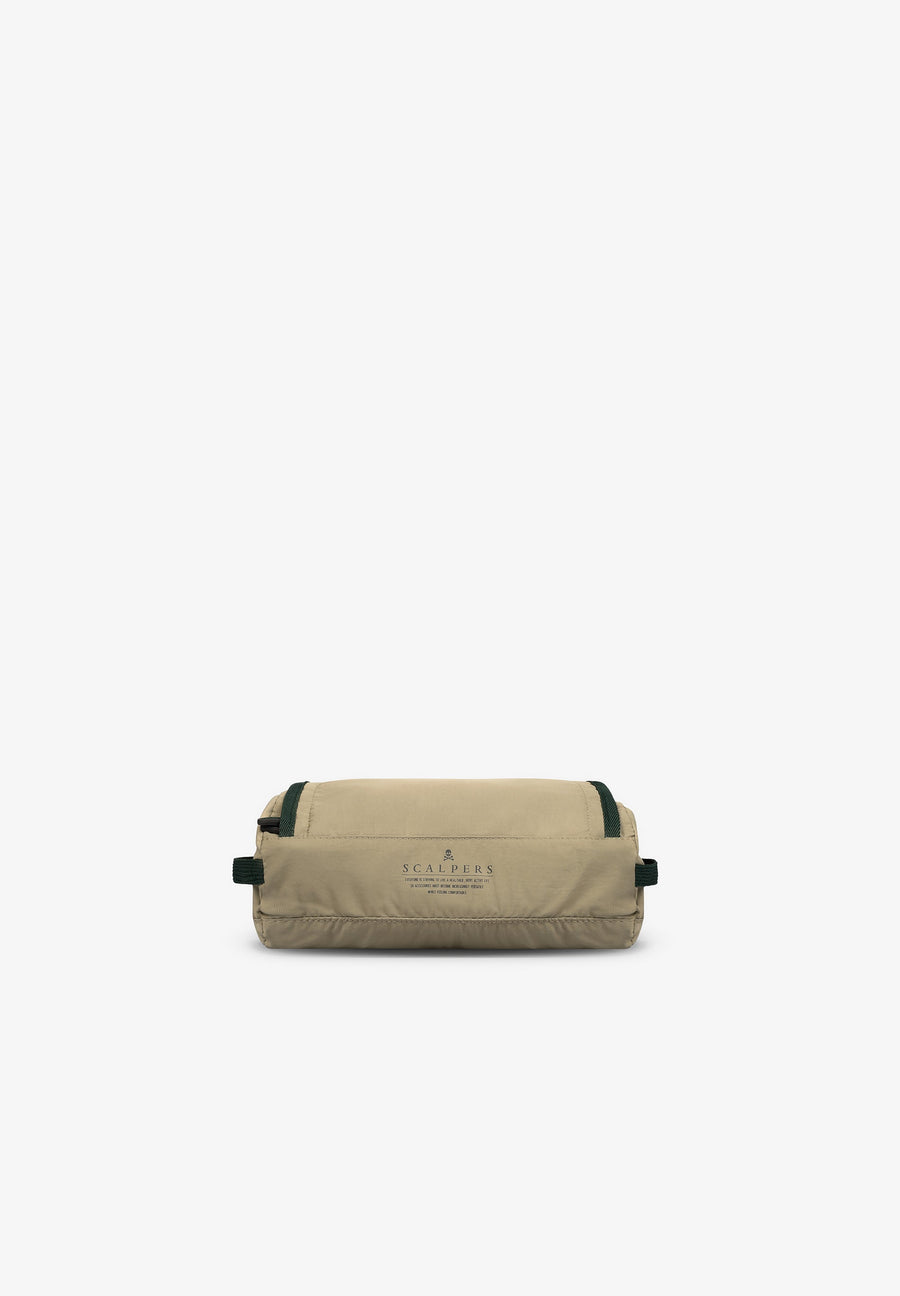 TOILETRY BAG WITH FLAP FASTENING