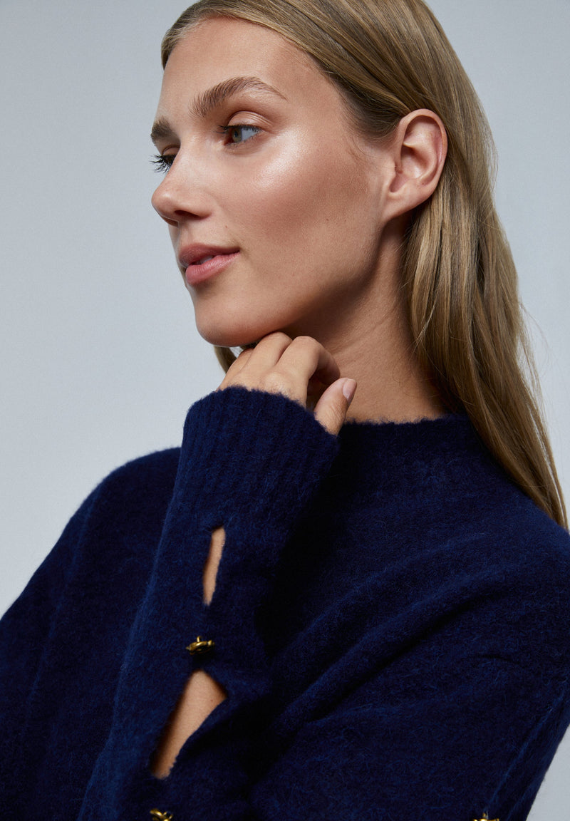 SWEATER WITH BUTTONED SLEEVES