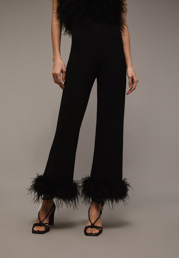 TROUSERS WITH FEATHERED HEM DETAIL