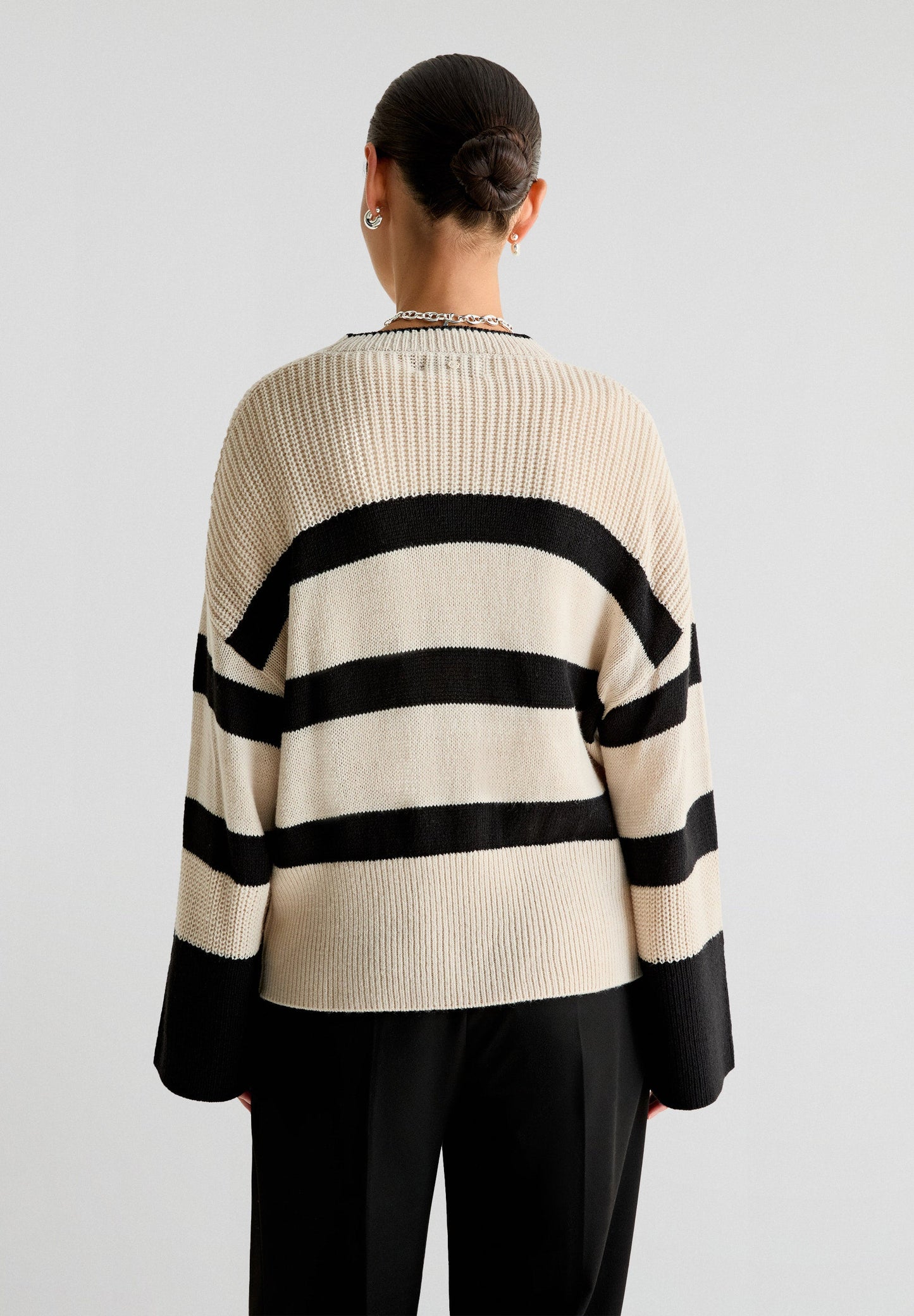 STRIPED SWEATER WITH FLARED SLEEVES