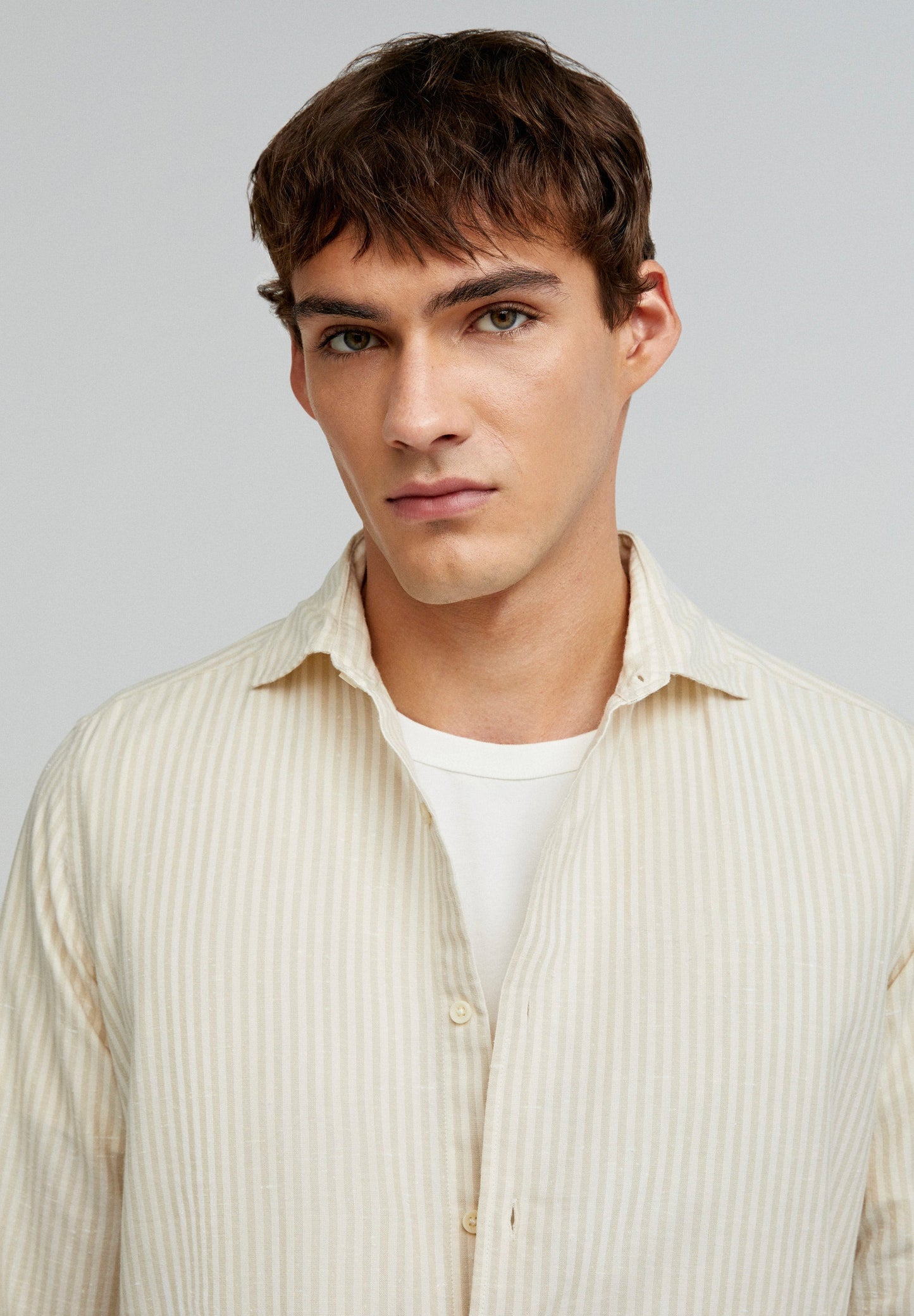 STRIPED SHIRT WITH SKULL AND FLAP