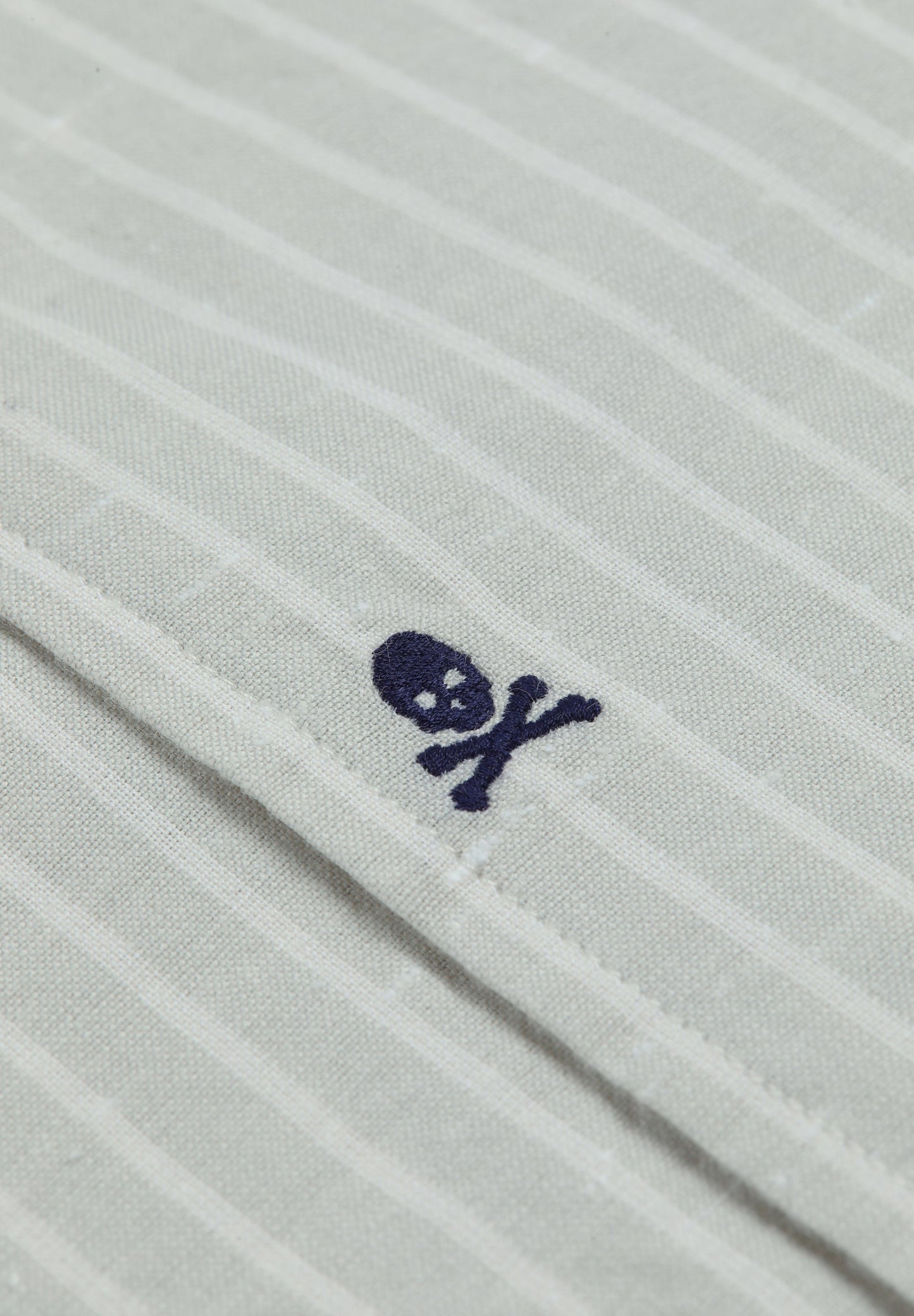 STRIPED SHIRT WITH SKULL AND FLAP