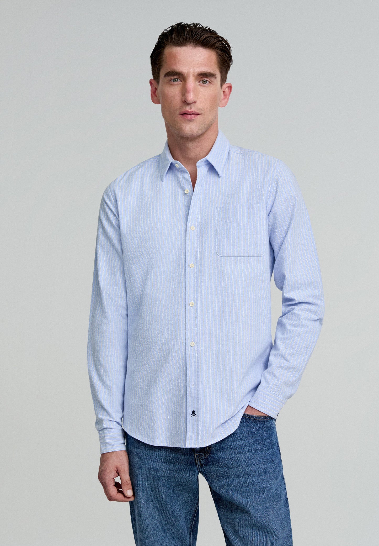 STRIPED SHIRT WITH POCKET AND SKULL ON THE PLACKET