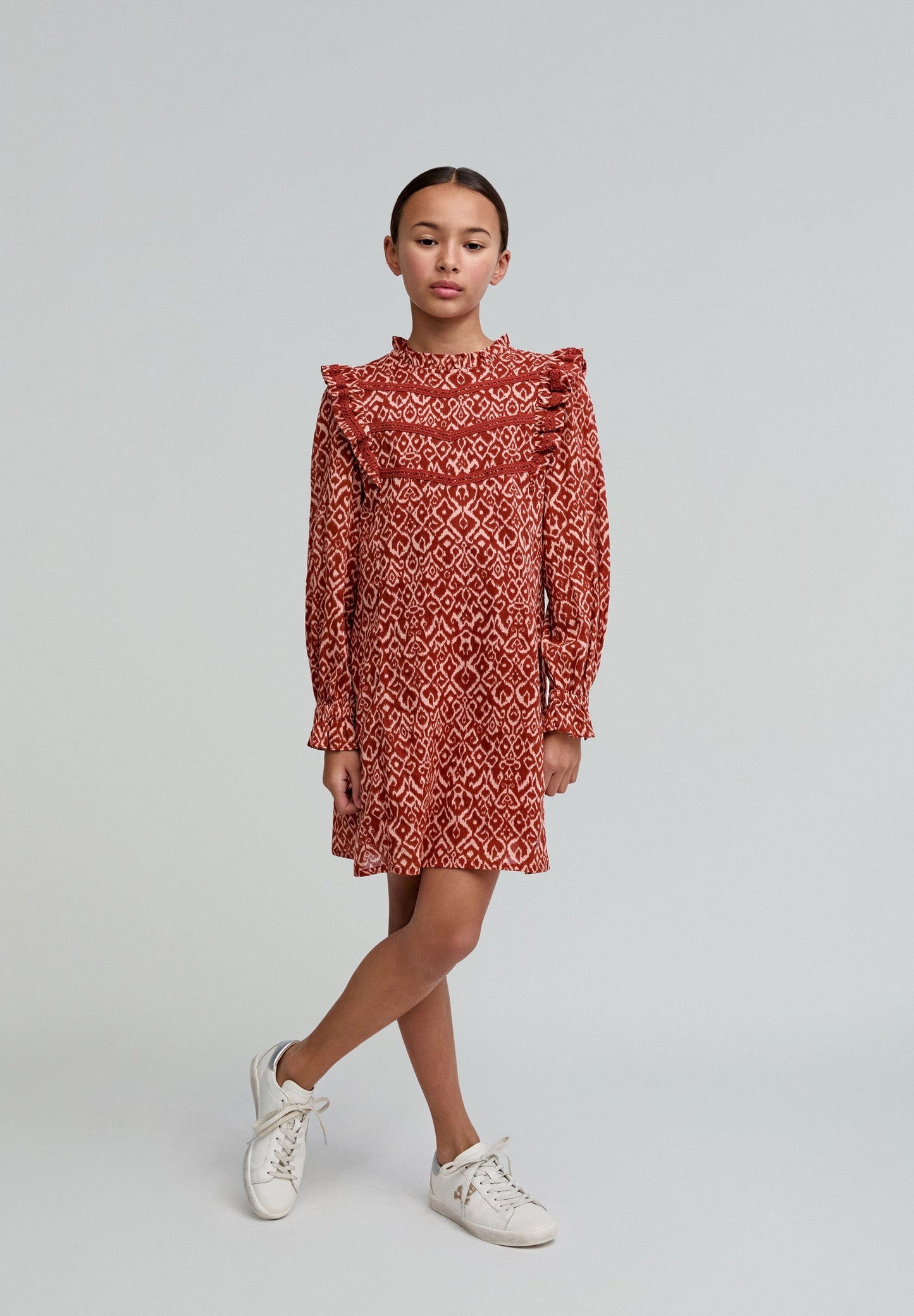 RUFFLED DRESS WITH AN ETHNIC PRINT