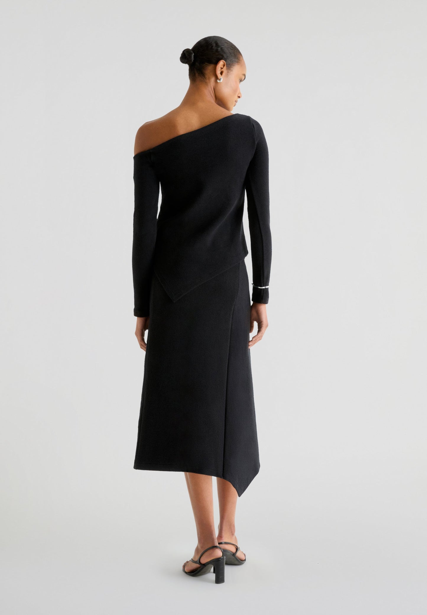 ASYMMETRIC KNIT MIDI SKIRT