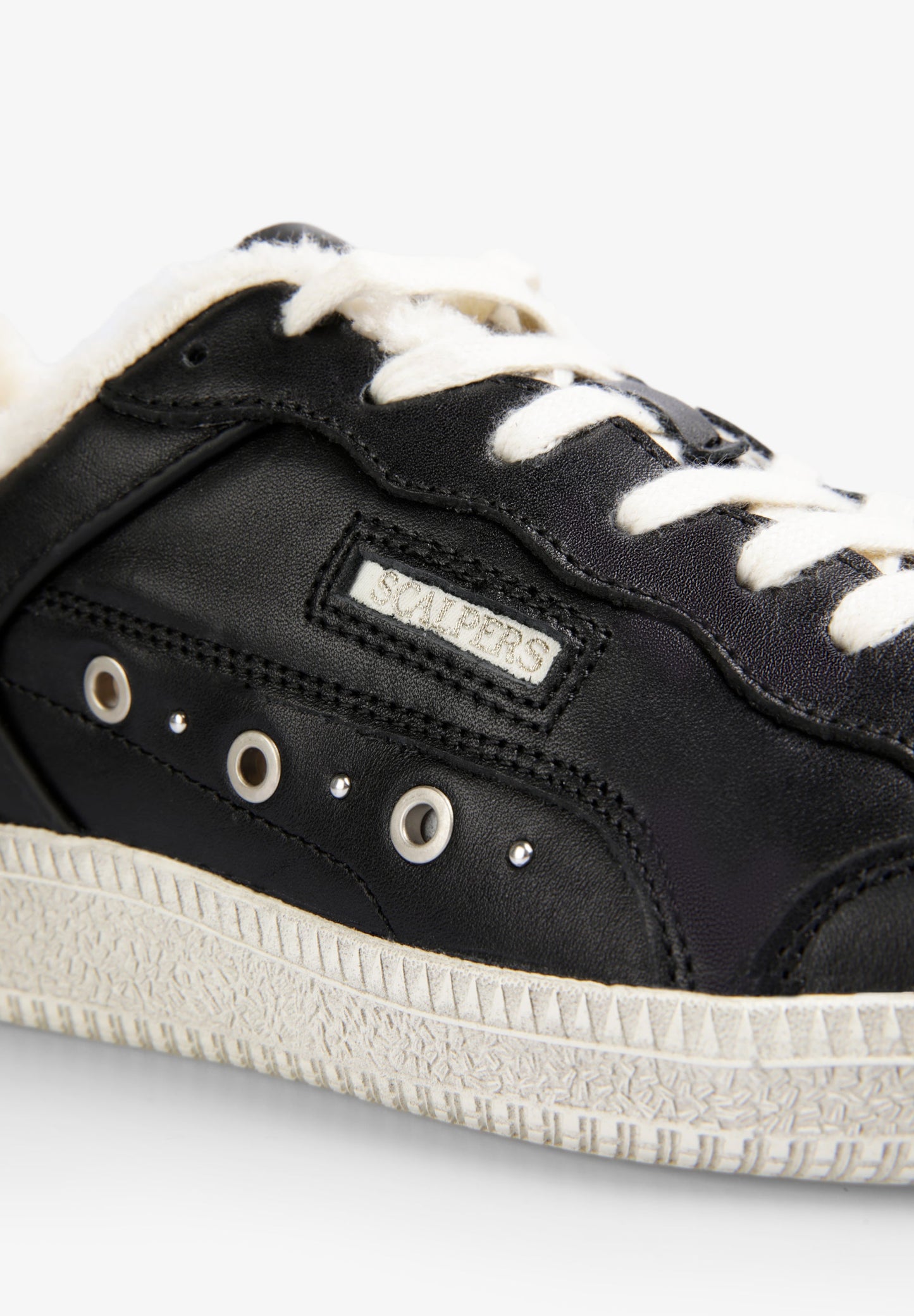 SHEARLING-LINED LEATHER SNEAKERS