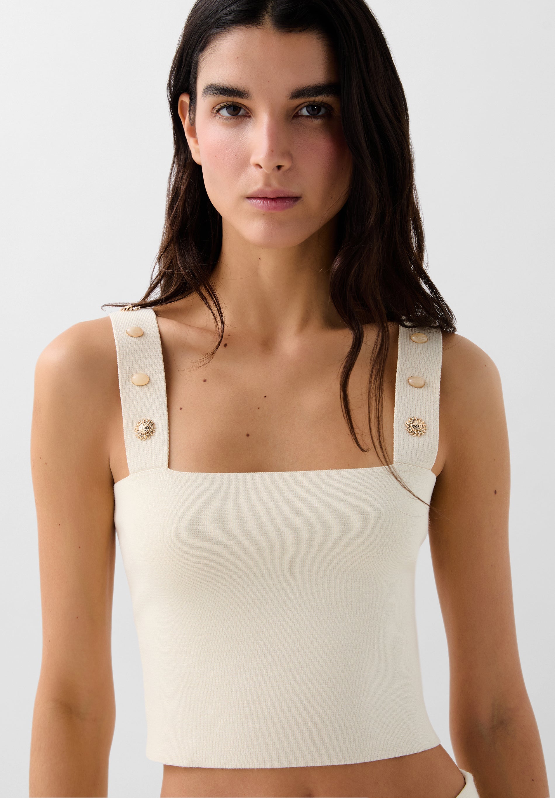 KNIT TOP WITH SUN DETAILS