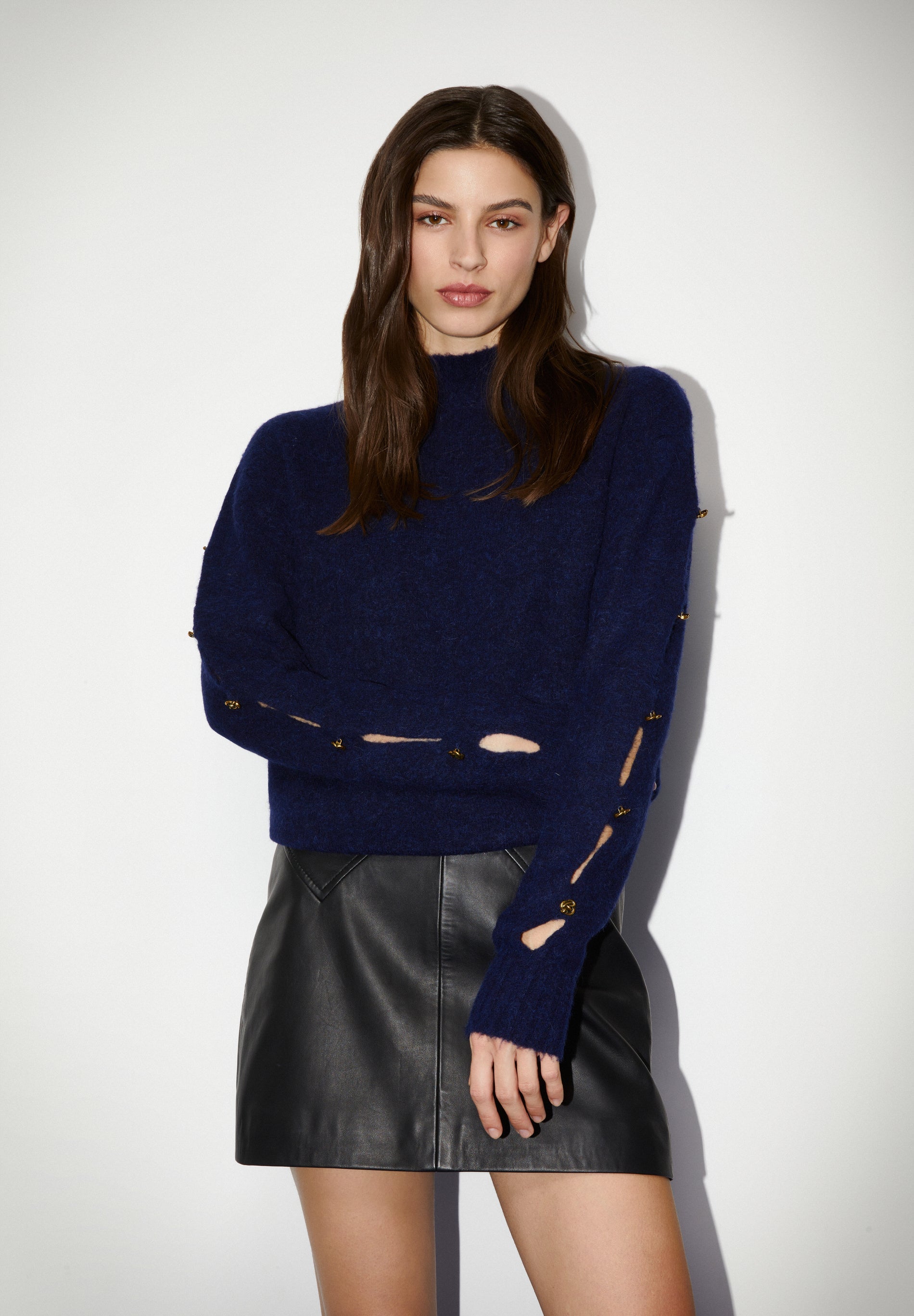 SWEATER WITH BUTTONED SLEEVES