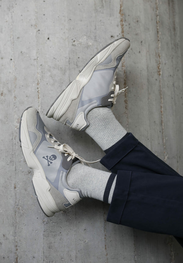 EMBOSSED SOLE SNEAKERS