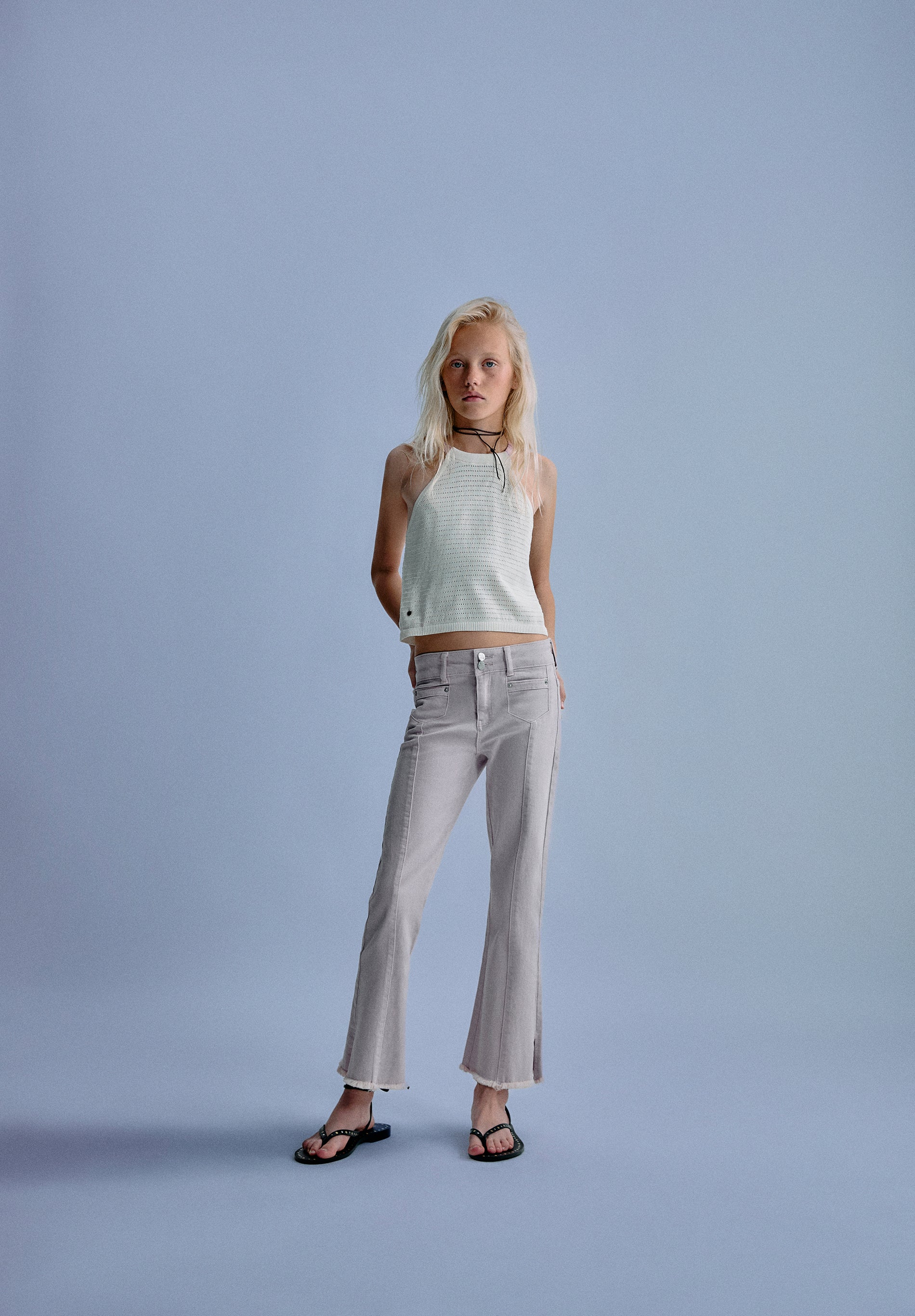FLARED TROUSERS WITH BUTTONS